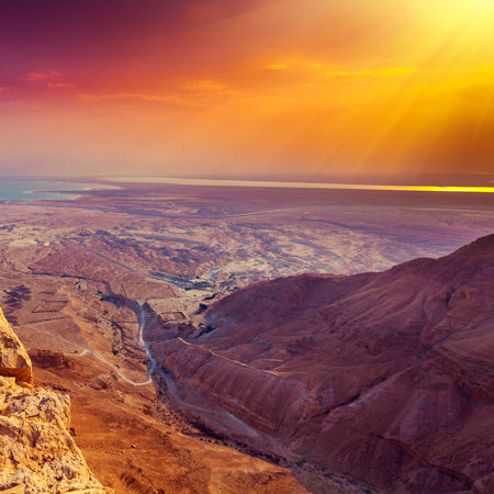Beautiful sunrise over Masada in Judaean Desert